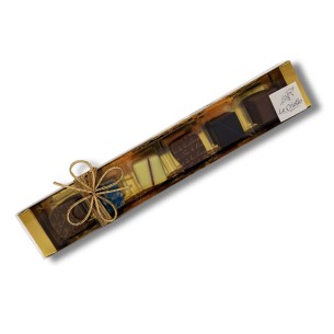 golden box with chocolates traditional assortment